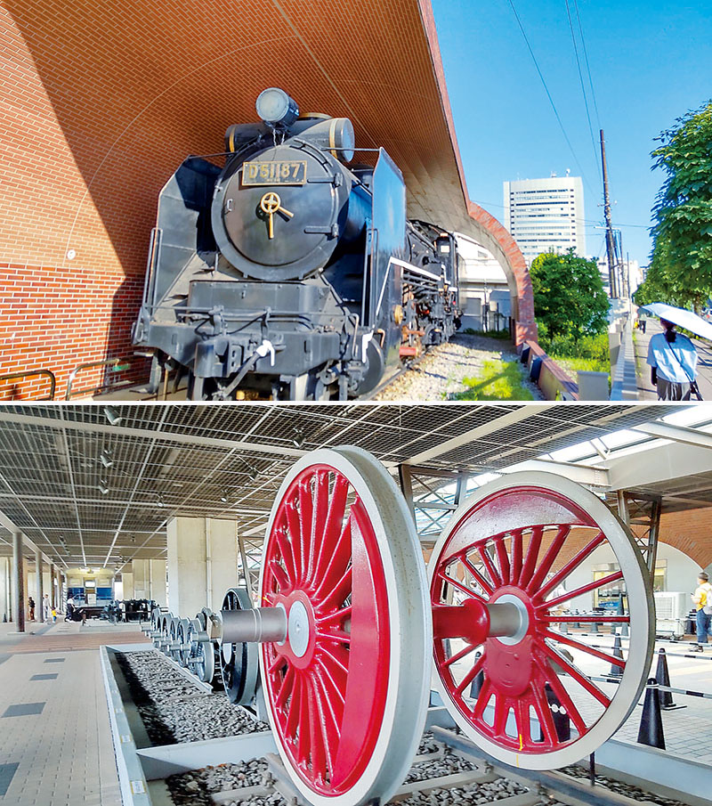 （上）旧国鉄大宮工場で初めて製造された由緒あるD51型蒸気機関車（1938年製）＝大宮総合車両センター（下）01型蒸気機関車（ドイツ）の動輪。直径2メートル＝鉄道博物館