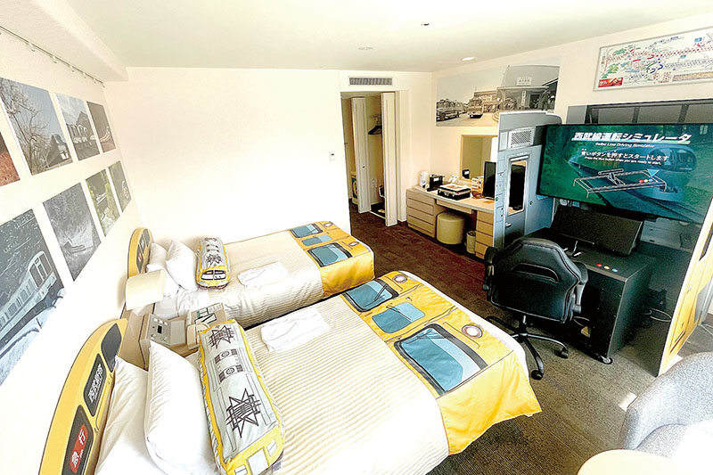 運転シミュレーターが楽しめる鉄道仕様の内装の部屋
