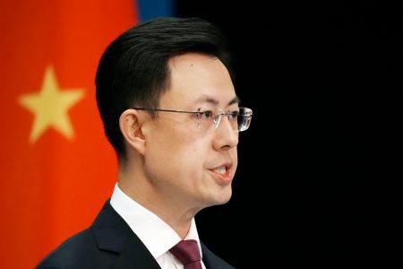 　記者会見する中国外務省の郭嘉昆副報道局長＝２１日、北京（共同）