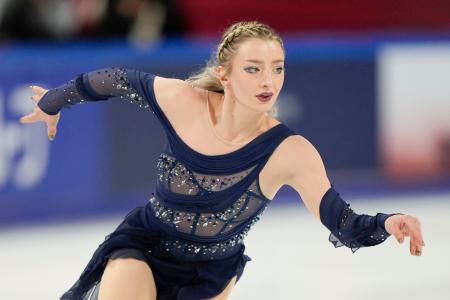 女子フリー 演技するアンバー・グレン=重慶(共同)