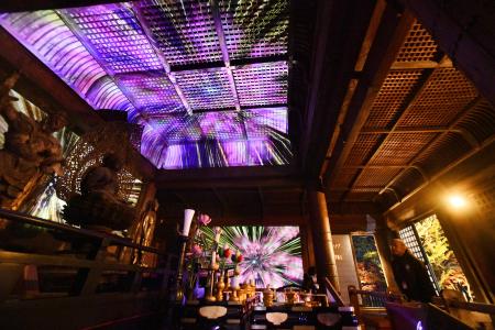 国宝に指定されている「白水阿弥陀堂」で行われたプロジェクションマッピングの試験点灯＝１３日午後、福島県いわき市