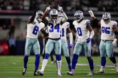 米プロフットボールＮＦＬカウボーイズの選手＝１４日（ＡＰ＝共同）