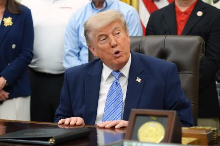 ２１日、米ホワイトハウスのイベントで発言するトランプ大統領＝ワシントン（ＡＰ＝共同）