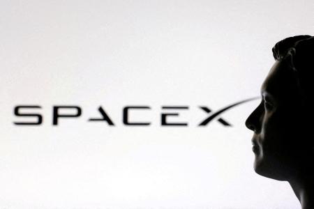 スペースXのロゴ(ロイター=共同)