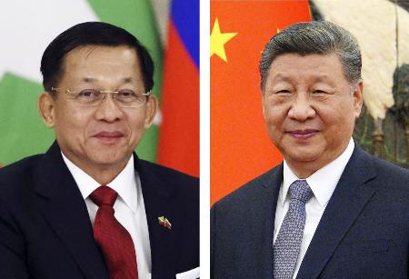 左からミンアウンフライン氏、中国の習近平国家主席（いずれもゲッティ＝共同）