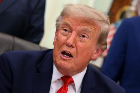 　ホワイトハウスで発言するトランプ米大統領＝２９日、ワシントン（ゲッティ＝共同）
