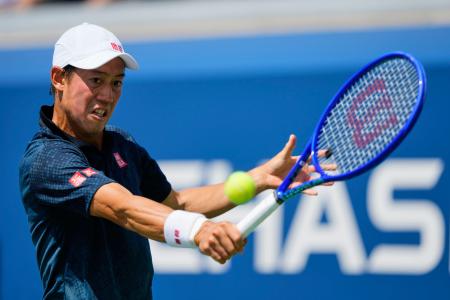 男子シングルス予選１回戦でプレーする錦織圭＝ニューヨーク（ＡＰ＝共同）