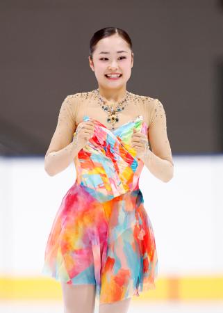女子フリーの演技を終え、笑顔の島田麻央。ＳＰ２位から逆転優勝した＝田中貴金属アイスアリーナ