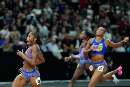 200mを制し、女子短距離2冠のメリッサ・ジェファーソンウッデン(左)=13日、ブダペスト(AP=共同)