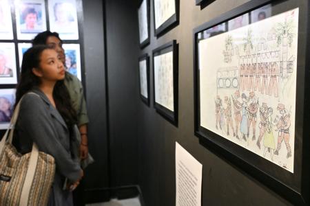 旧日本軍による性暴力の実態を伝える展覧会で展示されるイラスト＝１日、フィリピン・マニラ（共同）